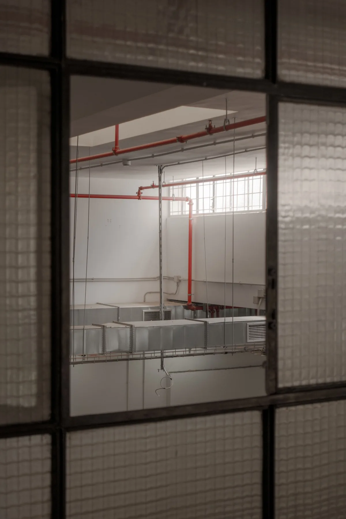 Industrial ventilation ductwork inside a large building