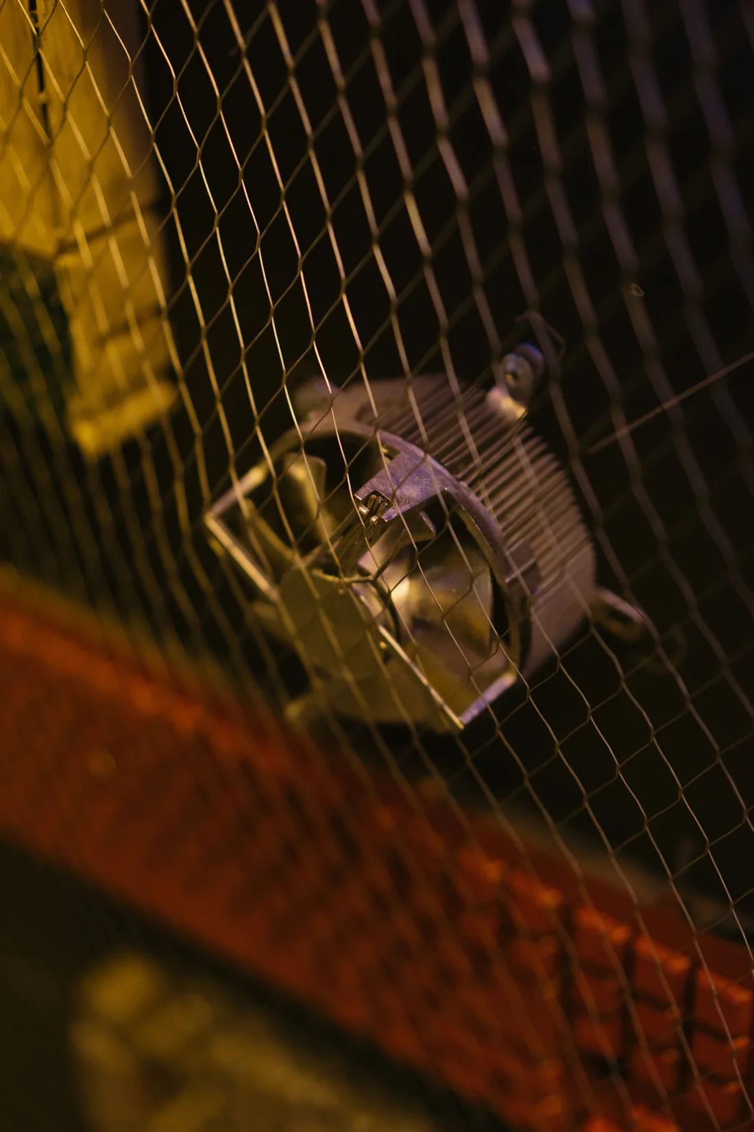 Industrial fan protected by metal mesh
