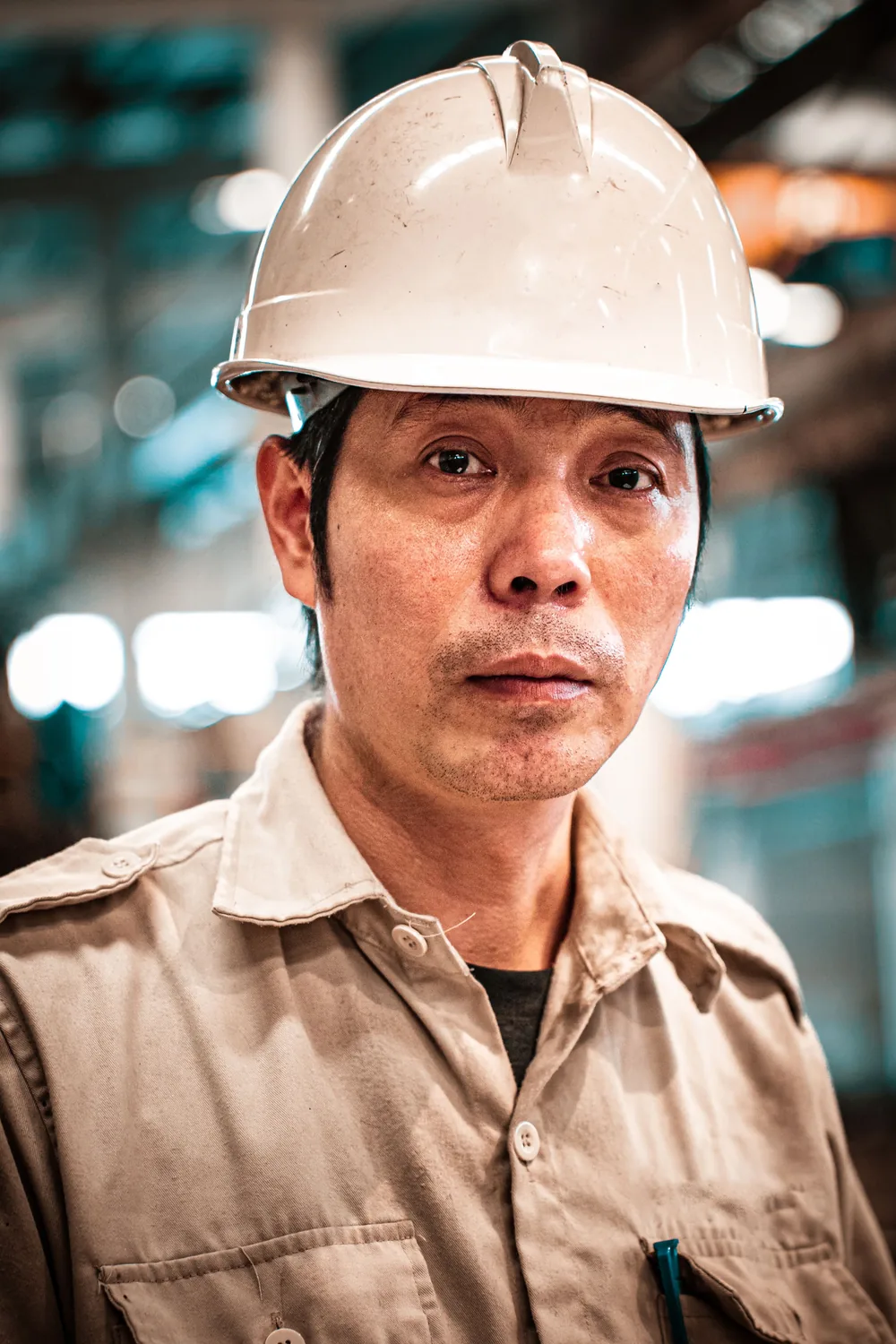 Industrial service professional wearing a safety helmet